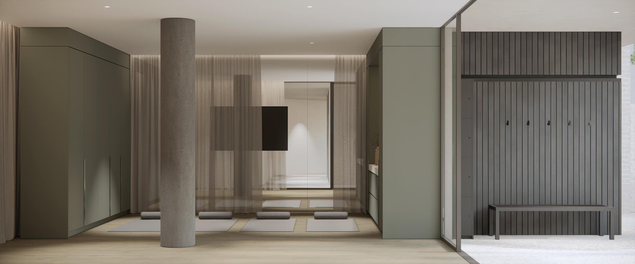 Minimalist yoga studio with three mats and bolsters on light wood floor, sheer curtains, green cabinetry, and a bench with hooks on dark wood paneling.