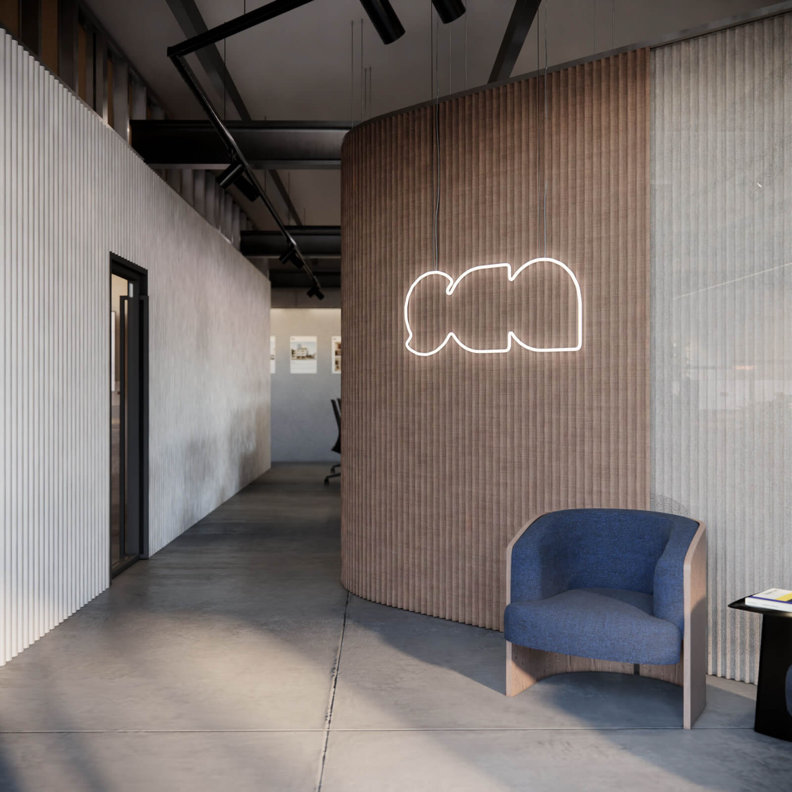 Modern office foyer with curved textured wall, blue armchair, and neon light fixture overhead.